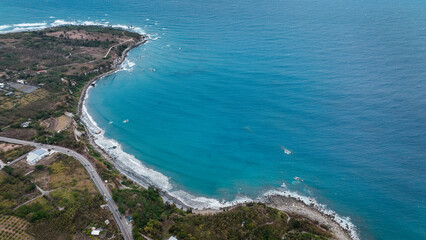 Aerial view of beautiful coastal landscape in Taiwan showcasing waves and rocky shoreline