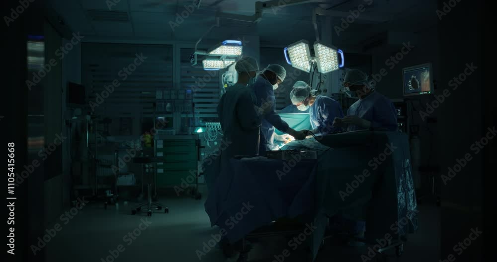Poster surgeons and assistants perform delicate surgical work. specialists staying calm, monitoring vital r