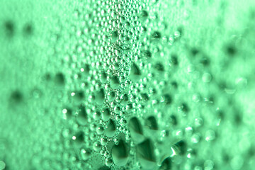 Tiny Bubbles on a Colour Background Condensation Green Steam Water