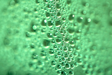 Tiny Bubbles on a Colour Background Condensation Green Steam Water