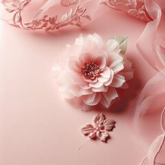 Organza flower on a delicate powder pink background. Copy space
