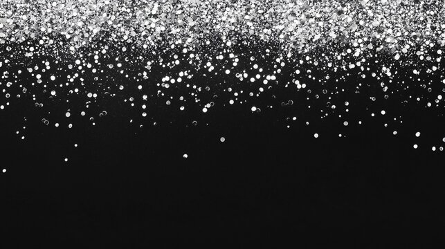 A soft, glittering effect of silver confetti scattered evenly at the top of a midnight black background, with a blank area below for text