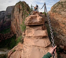 Making my way across a foot-wide, thousand-foot-high portion of trail (Angels Landing, Zion...