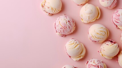 Overhead view of ice cream scoops on solid pink background. Scoops display swirls of pink, white. Perfect for sweet treats. Variety of colors, textures available. Eye-catching image offers copy space