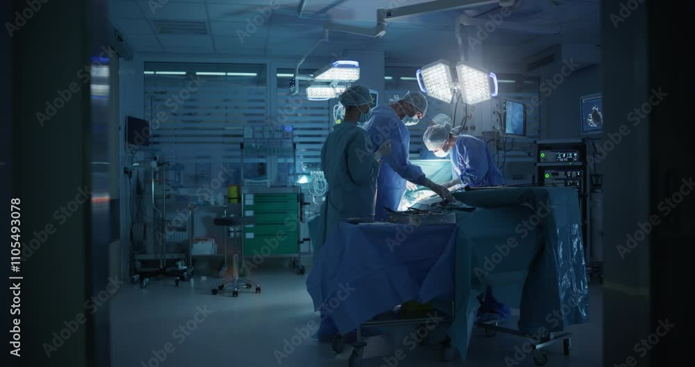 Poster surgeons and assistants maintain steady hands and clear communication as they continue the delicate 