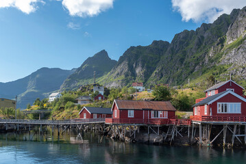Townscape with traditional fishermen's houses, so-called Rorbuer. A i Lofoten in Lofoten district...
