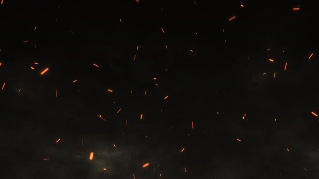 Glowing cinematic fire particles rising up with smoke and haze. Fire sparks flying fast with the wind. Bonfire, fire flakes background, fire ashes flow. Hot burning blaze, big flame, and disaster. 4k.