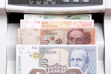 Spanish peseta in the counting machine