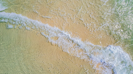 Top view of sea waves on the white sandy beach of the Andaman Sea, Phang Nga Province, Thailand, Asia