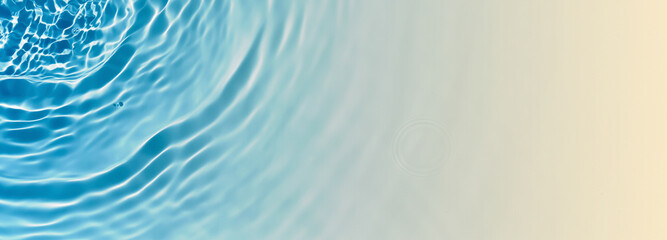 abstract blue water wave at the sunny sand beach from above, empty beach holiday background banner...