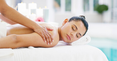 Woman, hands and back massage with masseuse at spa for body treatment, zen or relaxation at luxury...
