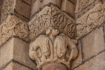 Romanesque capitals with carved figures of anthropomorphic animals