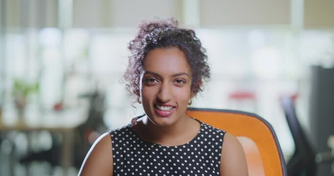 Indian happy young adult gen z expert intern woman lady look cam do day work talk distant client video call Head shot smiling teen girl female teach speak idea share study plan indoor job office place