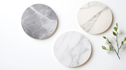 Three Round Marble Coasters in Various Shades on a White Surface with Minimalistic Plant for Elegant Home Decor Inspiration