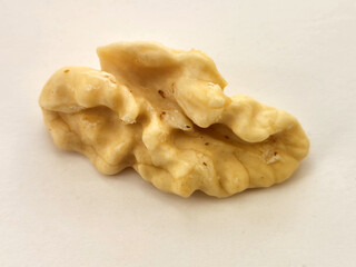 Walnut kernels. Peeled walnut kernel. Walnut kernel on a white background