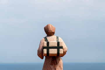 statue on the seaside cliff