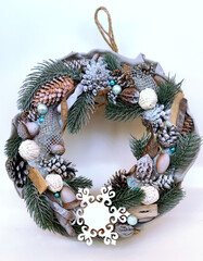 Christmas Wreath of pine branches, cones, leaves, beads and snowflakes. Holiday Decoration Gift For family and friends. New Year's home wall decor different angles handmade top view, side view