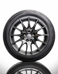 Obraz premium black car wheel isolated on white background