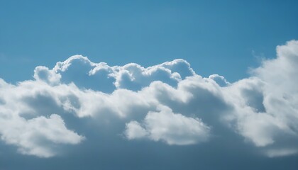 White clouds floating against a blue sky, serene natural beauty unfolds.