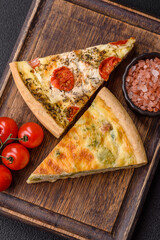 Delicious quiche with broccoli, cheese, chicken, spices and herbs