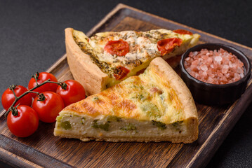 Delicious quiche with broccoli, cheese, chicken, spices and herbs