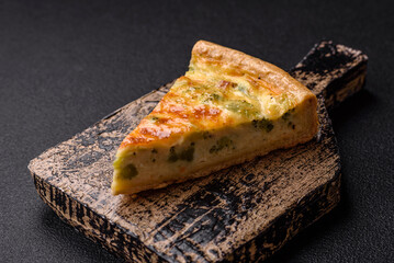 Delicious quiche with broccoli, cheese, chicken, spices and herbs