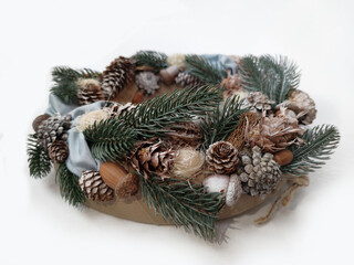 Christmas Wreath of pine branches, cones, leaves, beads and snowflakes. Holiday Decoration Gift For family and friends. New Year's home wall decor different angles handmade top view, side view