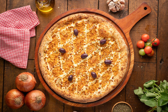 pizzas , queijos, cebola, assada, mussarela, azeitonas, brocolis,requeijao,frango,ovo,marguerita,milho e ervilhas