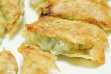 General home cooked baked dumplings, with an abundance of vegetables and garlic as ingredients