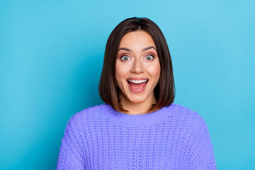 Fototapeta premium Portrait of attractive cheerful lucky amazed girl good incredible news reaction isolated over bright blue color background