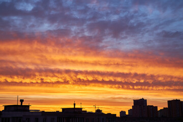 Fiery Sunset Sky Over City Silhouettes