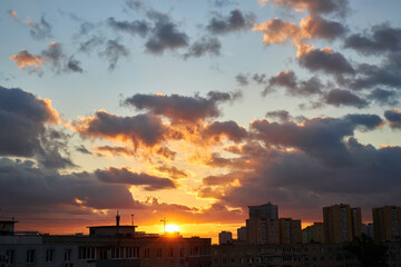 Fiery Sunset Sky Over City Silhouettes