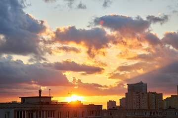 Silhouettes of Buildings Against a Fiery Sunset