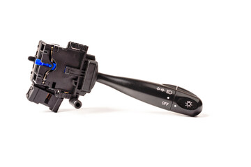 Close-up. Switches the direction indicator switch lever, also turns on the lighting, selective focus. Road safety