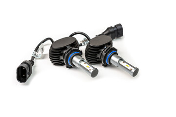 Light bulbs for car lamps. Automotive part in Silvery metallic and black color with wires and connecting elements