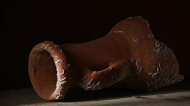 Old broken terracotta vase, handmade antique object
