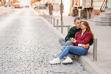 Cozy Autumn Afternoon with a Loving Couple in a Quaint Urban Setting