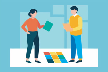 Obraz premium A man and a woman stand chatting holding folders. She wears a red sweater, he a yellow one. Pictures adorn the calm background.