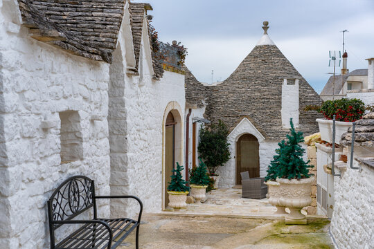 Alberobello iconic old Trullo and Trulli white houses with stone ceilings in conical shape, UNESCO World Heritage Site, Alberobello, Apulia, Italy