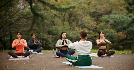 People, outdoor nature and namaste at yoga class, meditation and support for spiritual wellness. Forest, holistic healing and instructor for fitness in Japan, friends group and chakra mindfulness