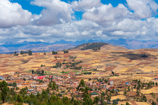 Racchi village near Chinchero with distant views of Andes mountains, Sacred Valley, Peru