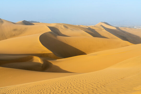 Sand dunes in desert at sunset, Huacachina, Ica District, Ica Province, Ica Region, Peru