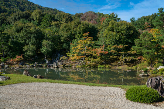 Sogenchi Teien (Sogen Pond Garden) is the Japanese garden on the territory of the Tenryu-ji Buddhist Temple on a sunny autumn day, Kyoto, Ukyo Ward, Japan
