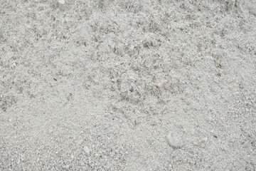 Close-up of light gray construction sand 