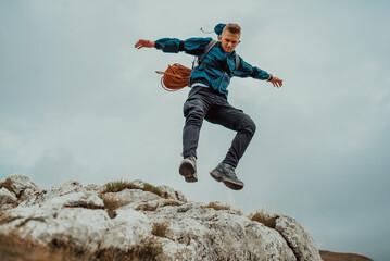 A male hiker hiking trail mountain, extreme sport outdoor, adventure travel. High quality photo