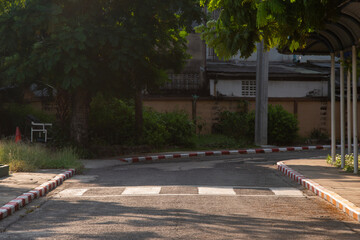 Zebra crossing for pedestrians to cross the road at school.