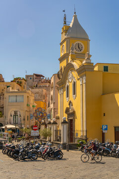 View of clock tower of Church of Santa Maria della Pieta in the fishing port Marina Grande, Procida, Phlegraean Islands, Gulf of Naples, Campania, Southern Italy, Italy