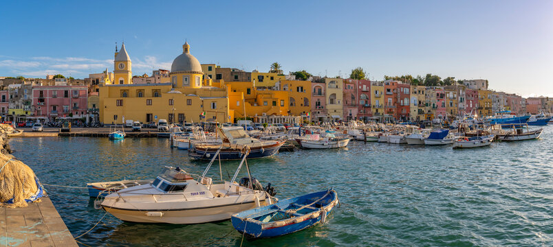 View of Church of Santa Maria della Pieta in the fishing port Marina Grande with boats at golden hour, Procida, Phlegraean Islands, Gulf of Naples, Campania, Southern Italy, Italy