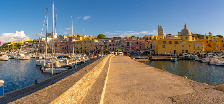 View of Church of Santa Maria della Pieta in the fishing port Marina Grande with boats at golden hour, Procida, Phlegraean Islands, Gulf of Naples, Campania, Southern Italy, Italy