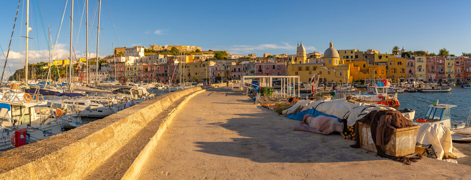 View of Church of Santa Maria della Pieta in the fishing port Marina Grande with boats at golden hour, Procida, Phlegraean Islands, Gulf of Naples, Campania, Southern Italy, Italy